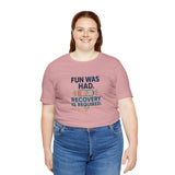 Dusty pink crewneck T-shirt with “Fun was had” and “Recovery is required” graphic