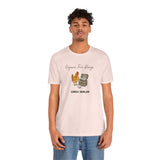 Soft pink crewneck T-shirt worn by model, chicken and egg graphic on front