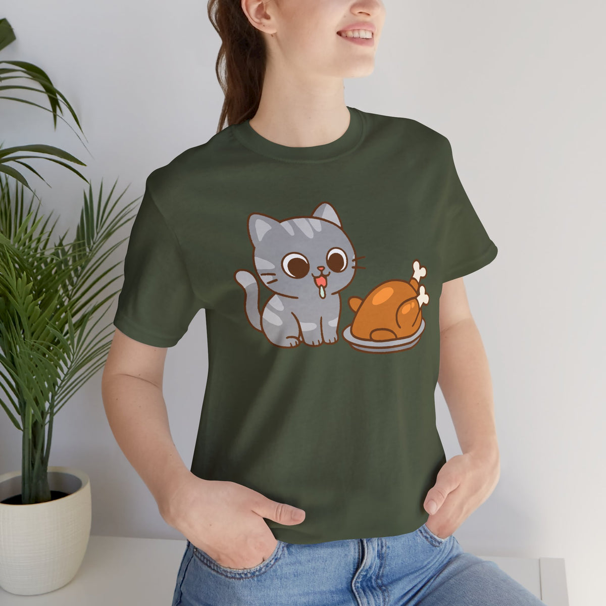 Olive green crew-neck t-shirt showing front cat and turkey graphic