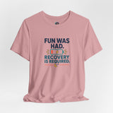 Light pink short-sleeve T-shirt with chest “Fun was had” recovery message graphic