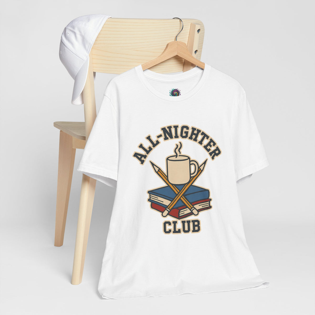 White short-sleeve t-shirt with “All-Nighter Club” coffee and books graphic on front