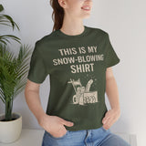 Sage green close-up T-shirt with “THIS IS MY SNOW-BLOWING SHIRT” snowblower design