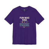 Team purple crew-neck T-shirt with centered multicolor “FUN WAS HAD. RECOVERY IS REQUIRED.” print