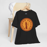 Black crewneck t-shirt with orange circular goddess emblem printed on front