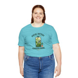 Turquoise crewneck T-shirt with 'Social Battery' garden mode graphic on front