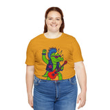 Mustard yellow t-shirt with colorful punk triceratops playing red electric guitar graphic