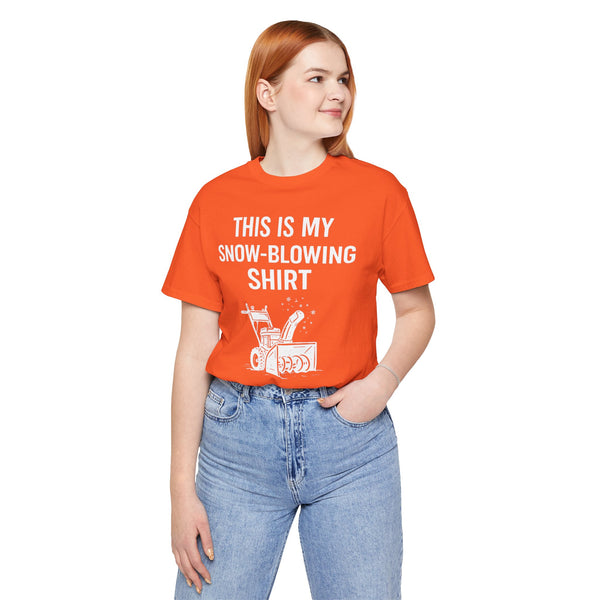 Orange crew-neck t-shirt with snow-blowing graphic and slogan on the front