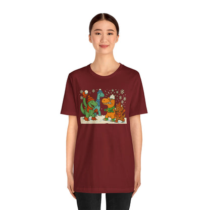 Dinosaur Snowball Fight T-Shirt – Funny Winter Dino Graphic Tee