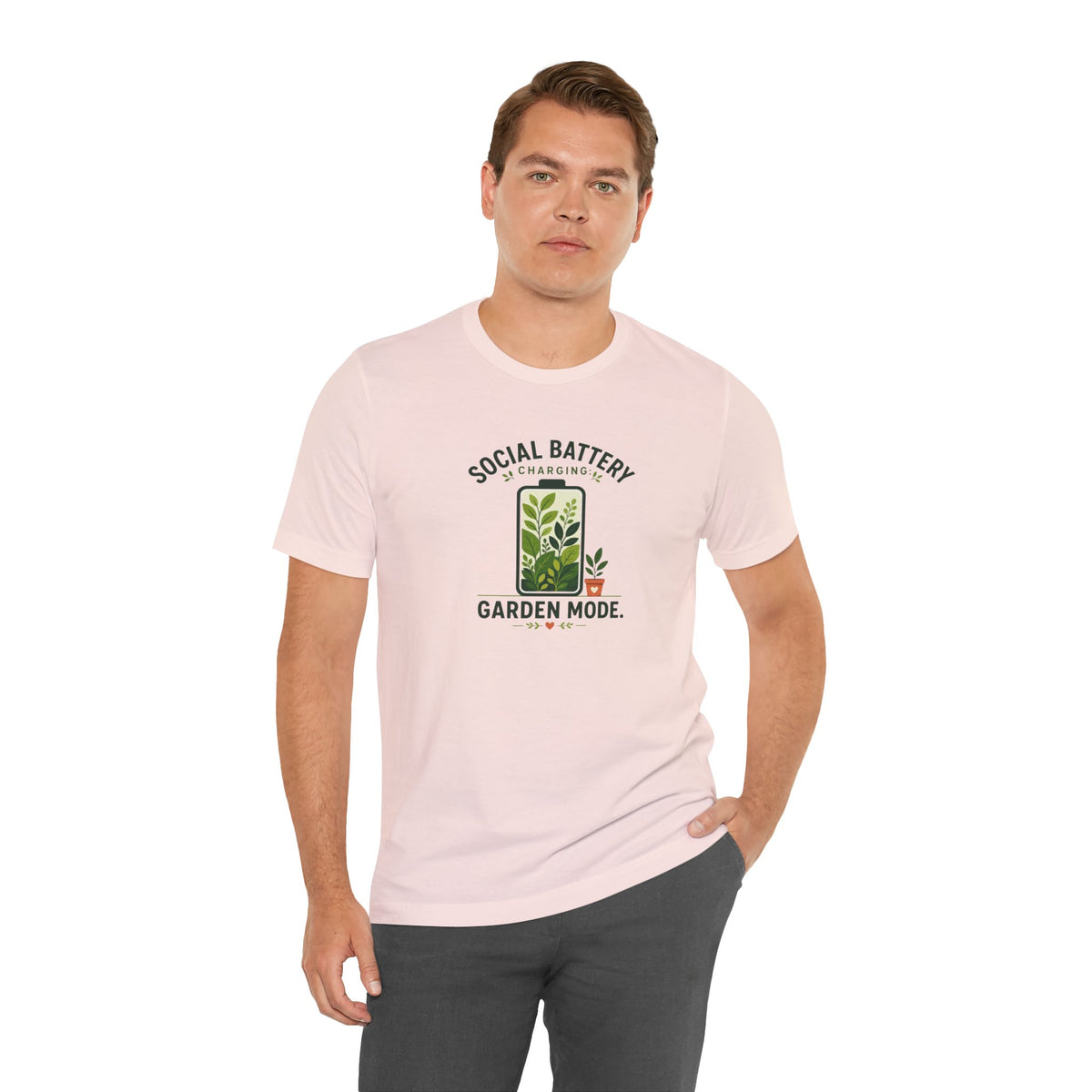 Soft pink T-shirt with 'Social Battery Charging' and 'Garden Mode' plant graphic