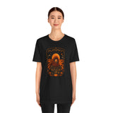Black T-shirt with centered orange sci-fi pumpkin graphic print, crew neck