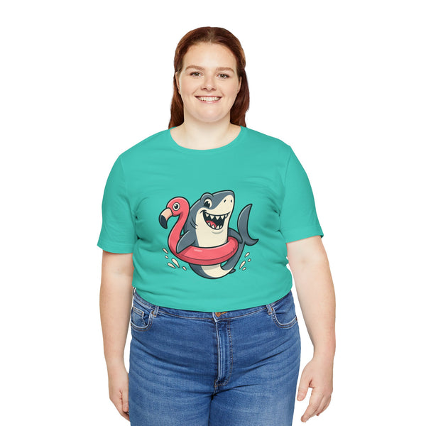 Teal crew-neck T-shirt with shark and flamingo floatie graphic, worn by woman