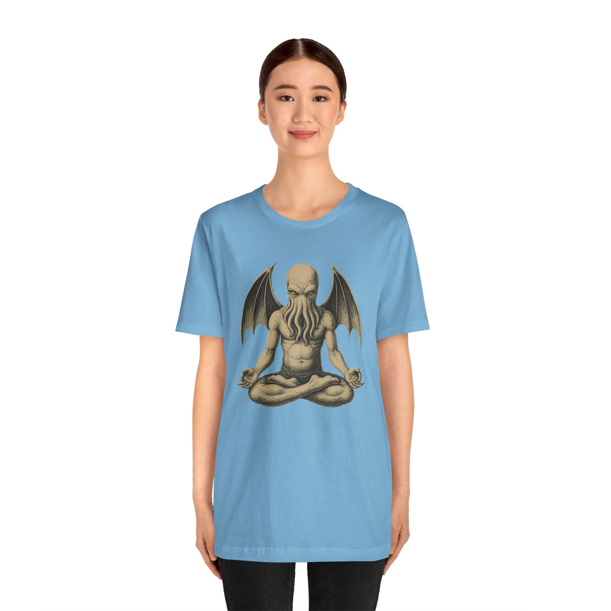 Light blue unisex crewneck t-shirt with meditating monster graphic on chest