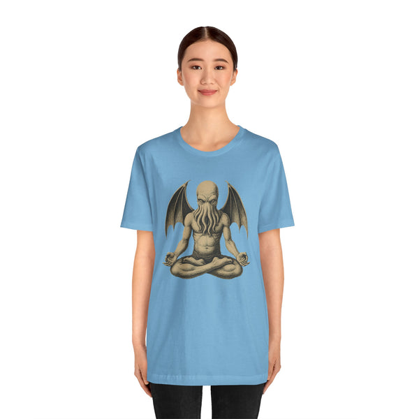 Light blue unisex crewneck t-shirt with meditating monster graphic on chest