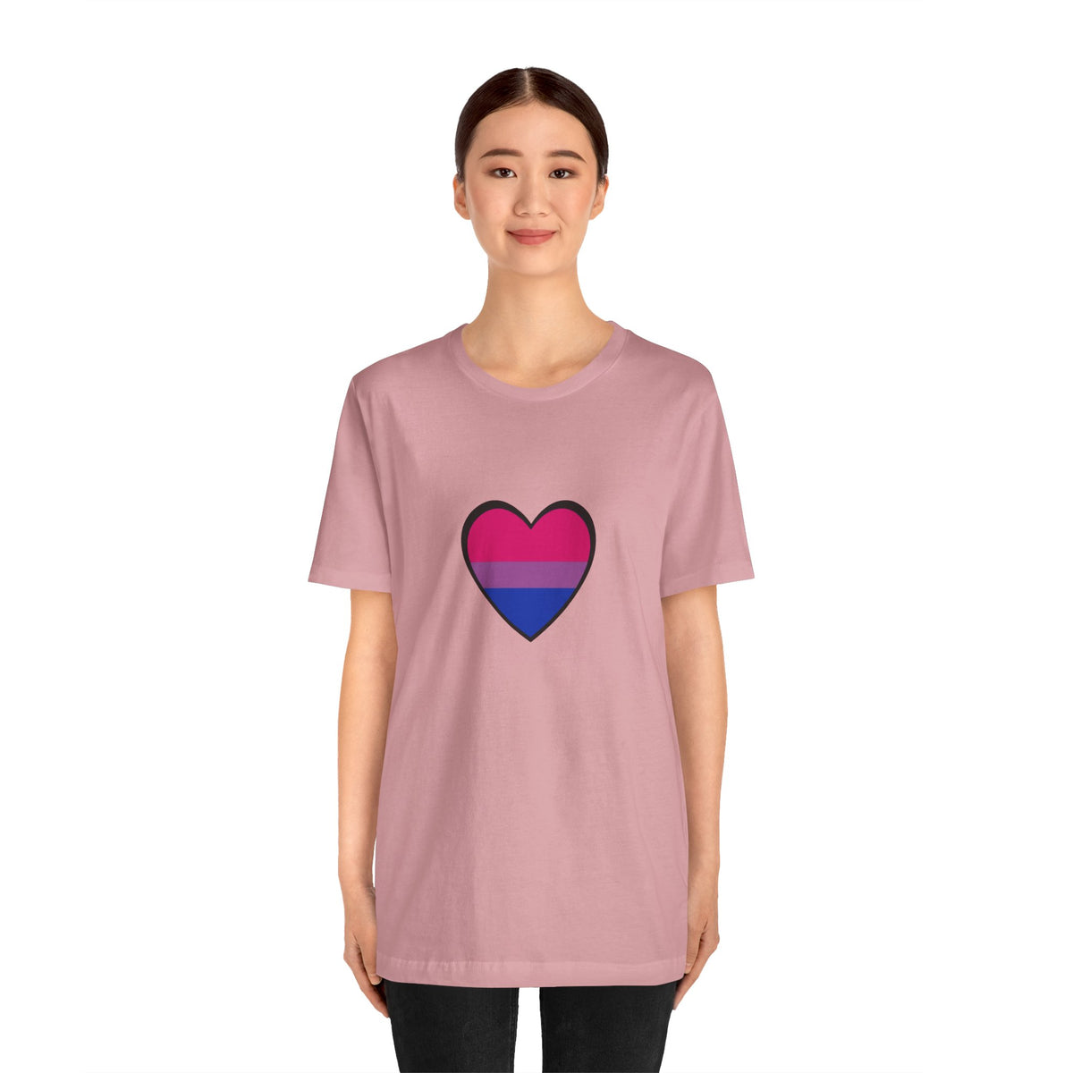 Soft pink T-shirt with an outlined heart Pride flag graphic at the center