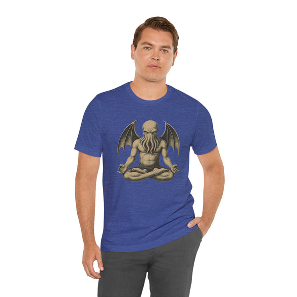 Blue unisex graphic T-shirt with a meditating monster illustration on the chest