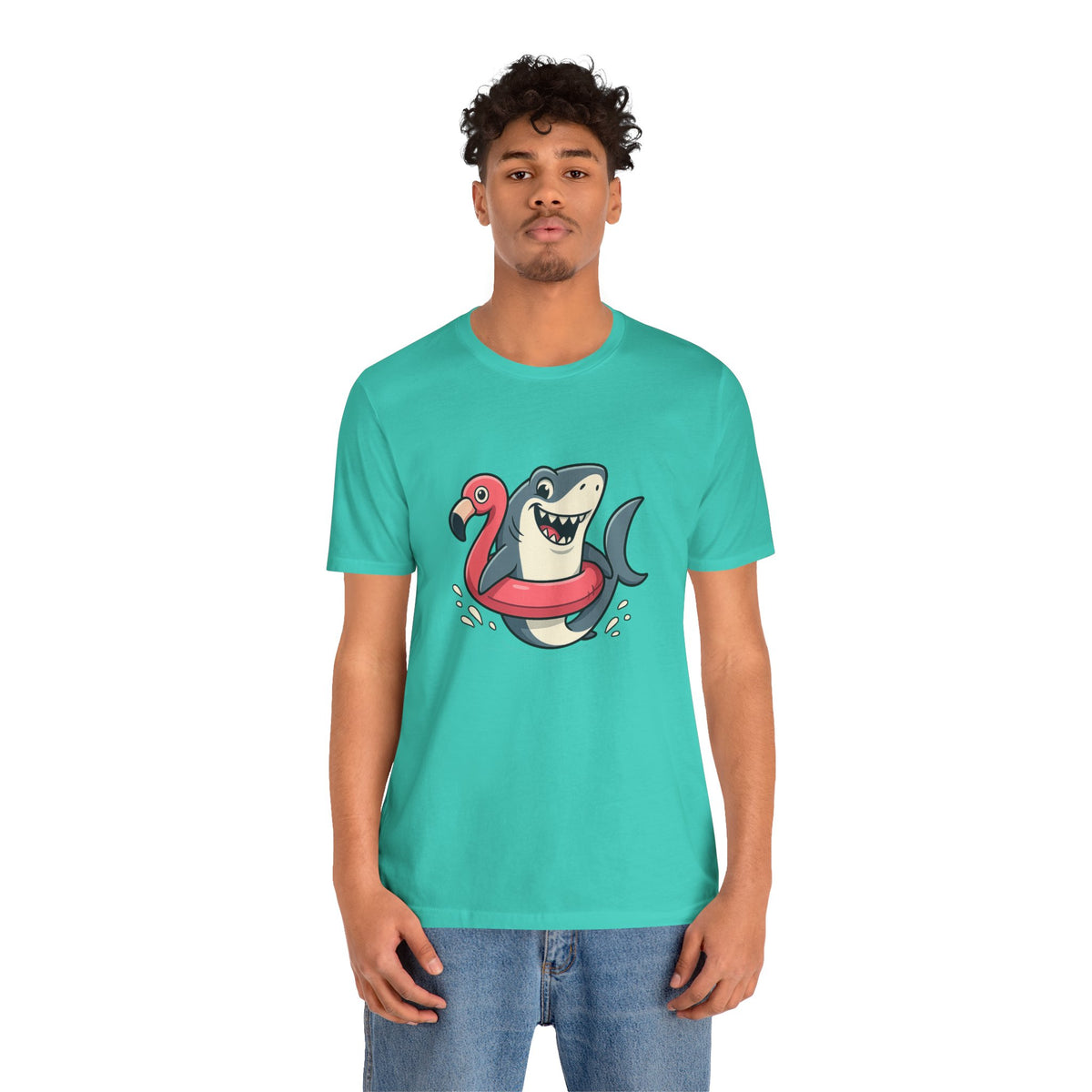 Teal crew-neck T-shirt featuring shark and flamingo floatie graphic, front view