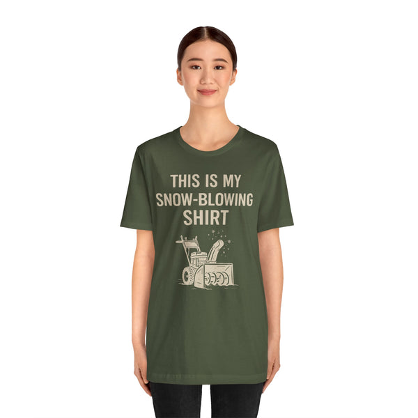 Sage green T-shirt with “THIS IS MY SNOW-BLOWING SHIRT” lettering and snowblower print