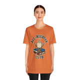 Orange crewneck T-shirt with All-Nighter Club coffee and books graphic