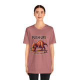Rose short-sleeve T-shirt featuring a dinosaur push-ups graphic on the chest