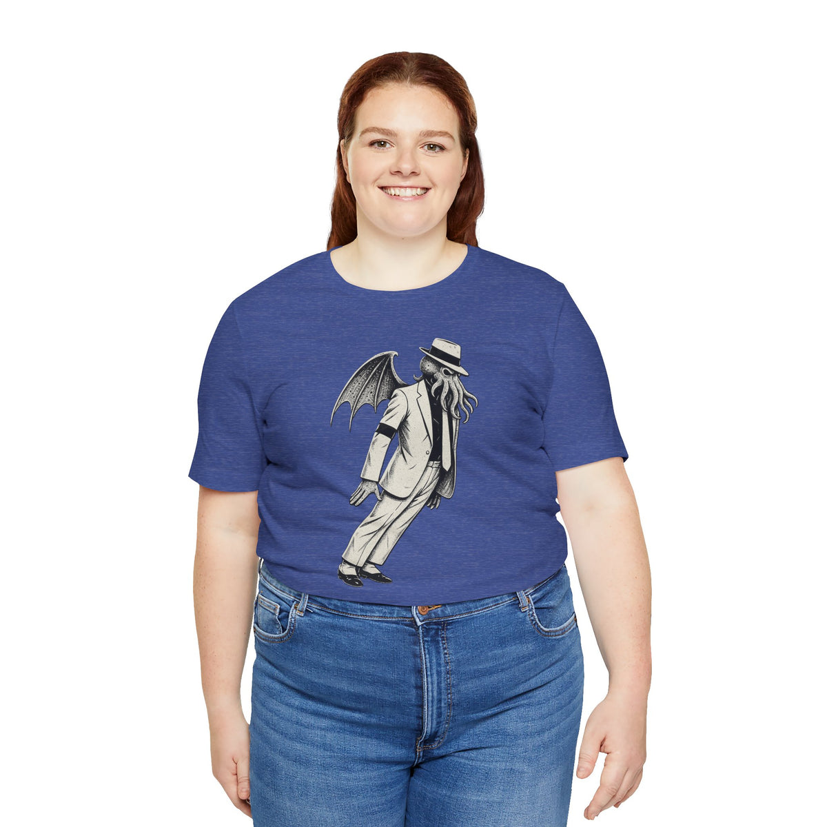 Blue crewneck t-shirt with front illustration of a winged, top-hatted monster