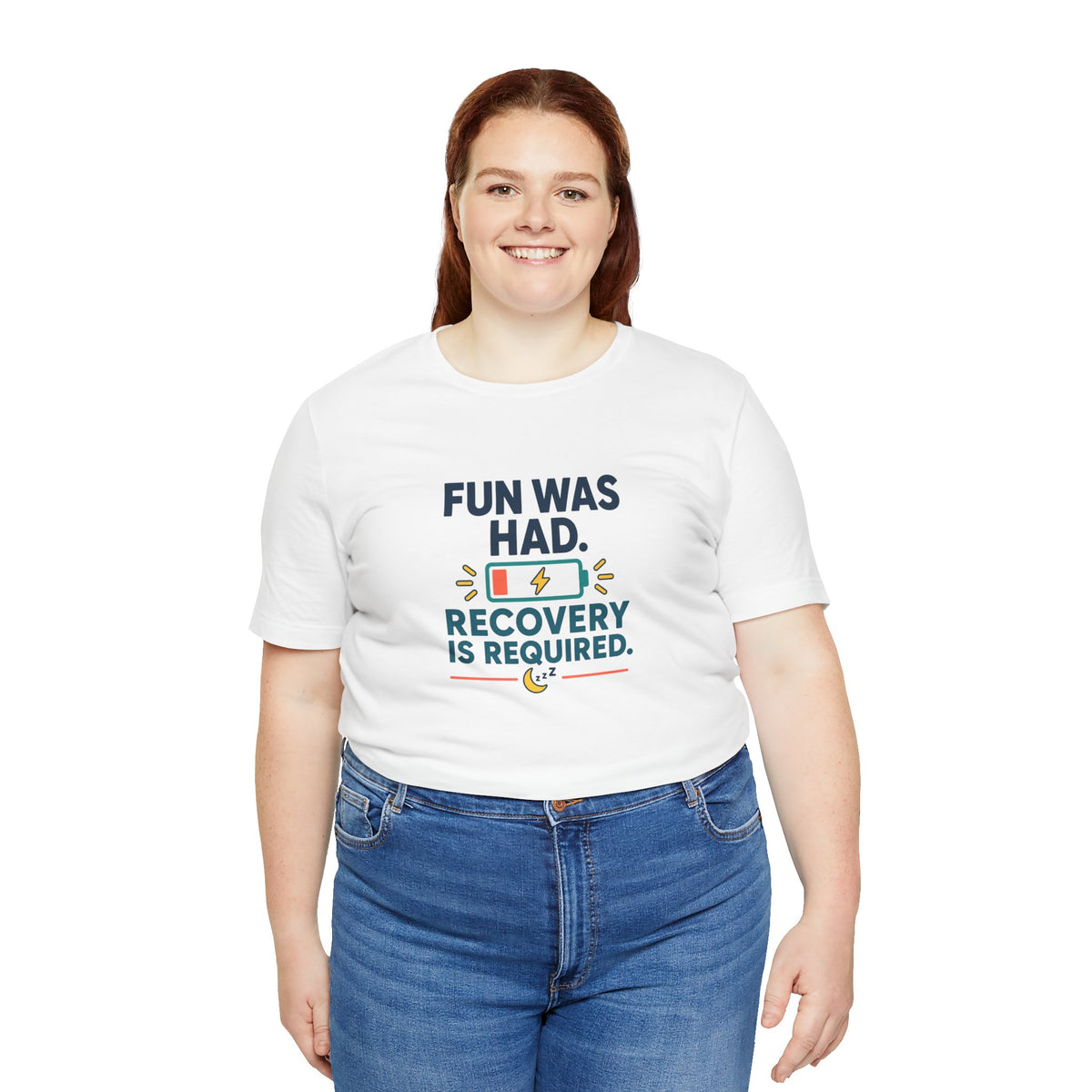 White crew-neck T-shirt with "Recovery is required" lightning graphic, worn by woman