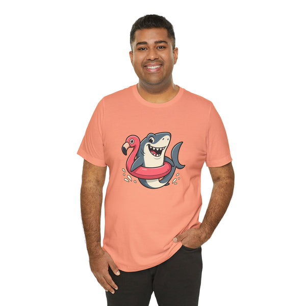 Coral crewneck T-shirt with shark and flamingo floatie graphic, smiling model