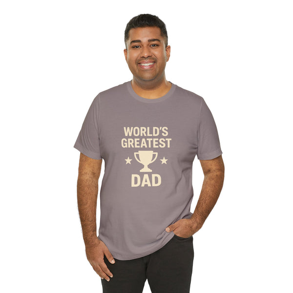 Dark gray crewneck T-shirt worn by model, trophy "WORLD'S GREATEST DAD" graphic