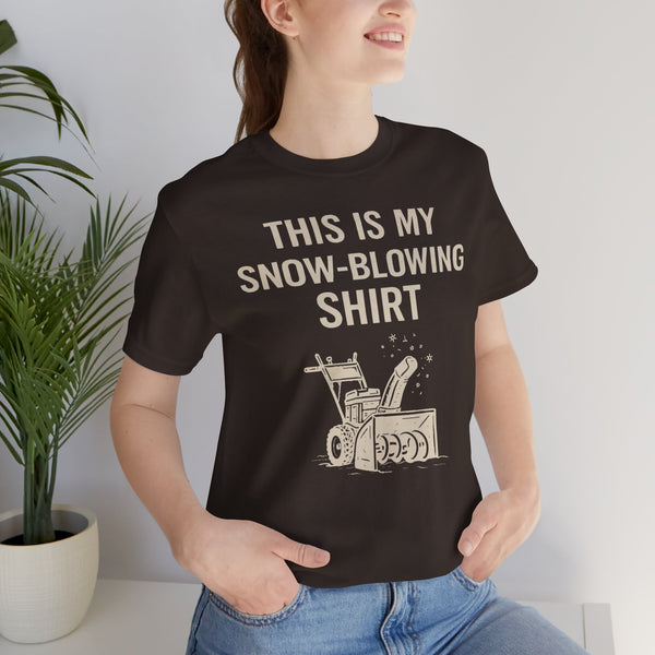 Black crew-neck t-shirt with snow-blowing graphic and slogan, worn by model