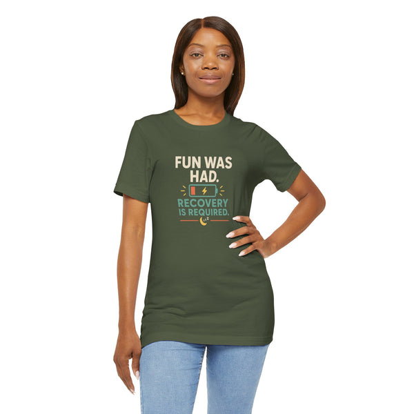 Dark green crew-neck t-shirt with colorful text and social battery graphic on chest.