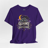 Purple graphic t-shirt with cartoon bat and 'Gloomy' logo print