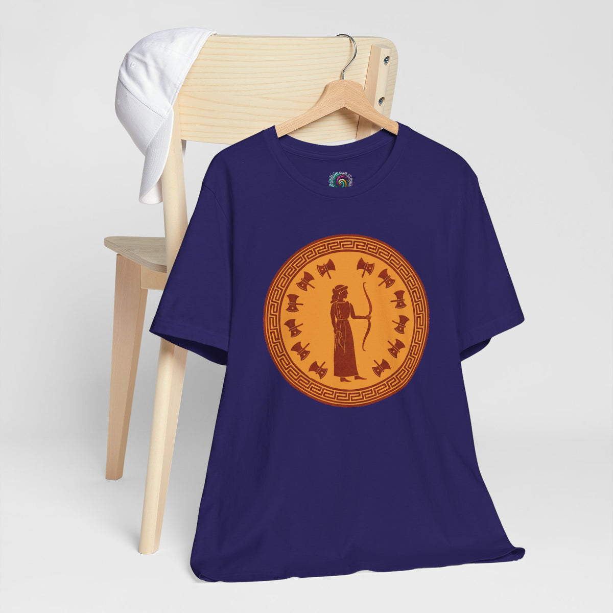 Navy crewneck T-shirt on hanger with round orange Greek-style figure logo on chest