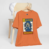Burnt orange T-shirt with “B is for Banshee” Halloween graphic on the front