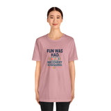 Light pink short-sleeve T-shirt with centered “Fun was had” recovery graphic