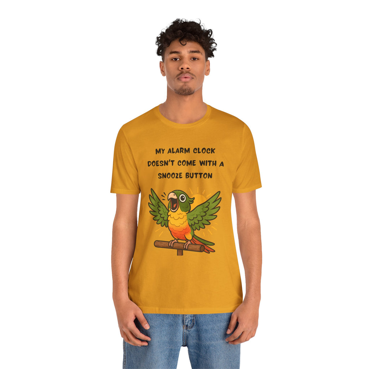 Mustard parrot graphic t-shirt featuring wings, text "MY ALARM CLOCK" and "SNOOZE BUTTON".