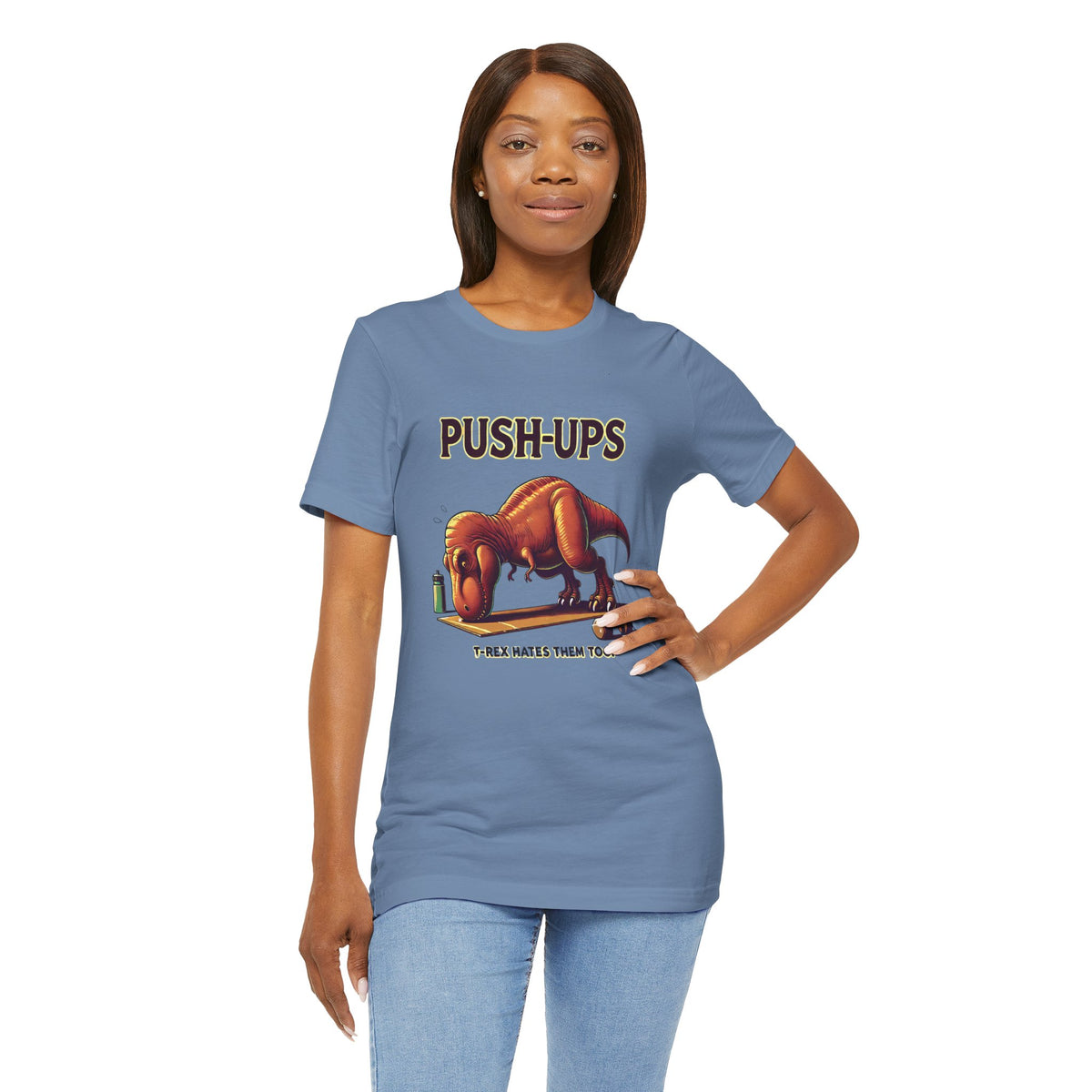 Blue crew-neck T-shirt with 'PUSH-UPS' T-Rex graphic, hand on hip pose
