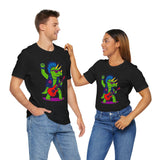 Black crewneck t-shirts for two people with colorful triceratops punk guitar graphics