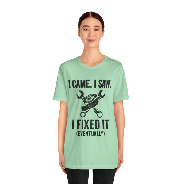 Mint green crew-neck short-sleeve T-shirt with black “I came, I saw, I fixed it” text