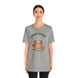 Heather gray crew t-shirt with axolotl reading books graphic and “I Axolotl Questions”