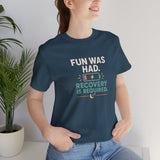 Navy short-sleeve t-shirt with chest text: “FUN WAS HAD” and “RECOVERY IS REQUIRED”