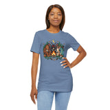 Blue crewneck T-shirt with campfire cryptid graphic, hand on hip