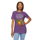 Purple crew-neck t-shirt on model featuring parrot wings graphic and alarm text