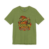 Olive green crew-neck graphic t-shirt with goblin mascot and colorful 'Goblin Mode' print