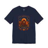 Navy crewneck T-shirt with orange pumpkin sci-fi face graphic on the front