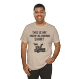 Tan short-sleeve T-shirt with “THIS IS MY SNOW-BLOWING SHIRT” text and snow blower graphic.