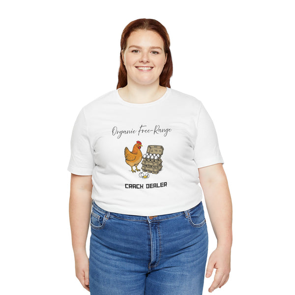 White crew-neck t-shirt worn by model; chest print shows chicken and egg carton