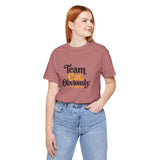 Heather mauve crewneck T-shirt with “Team Cat Obviously” cat graphic, angled view