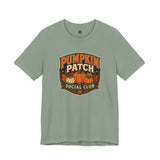 Sage green graphic T-shirt with Pumpkin Patch Social Club pumpkin logo