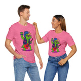 Pink crew-neck graphic T-shirts with punk triceratops electric guitar prints on two models