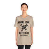 Beige crewneck tee on model featuring wrench and “I fixed it (eventually)” text