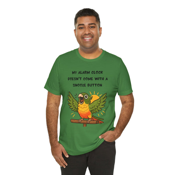Green parrot alarm T-shirt with winged bird illustration and “snooze button” slogan.